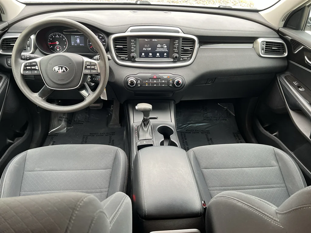 Used 2019 Kia Sorento LX with VIN 5XYPGDA36KG547068 for sale in Pella, IA
