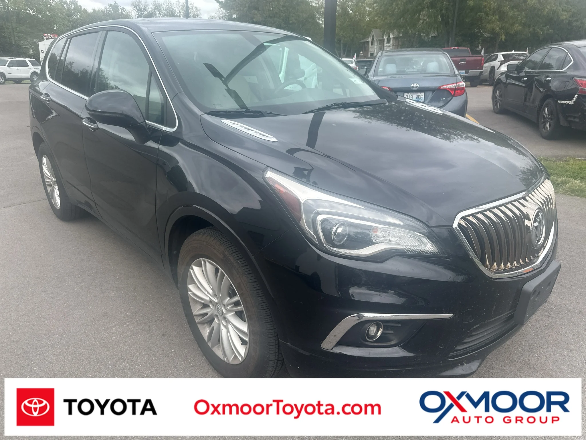 Used 2018 Ebony Twilight Metallic Buick Preferred image 1