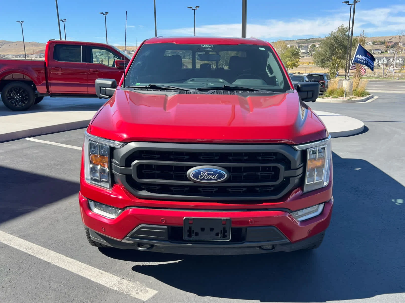 Certified Used 2022 Rapid Red Metallic Tinted Clearcoat Ford XLT image 3