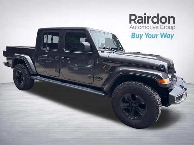 Used 2023 Granite Crystal Metallic Clearcoat Jeep Sport S image 1