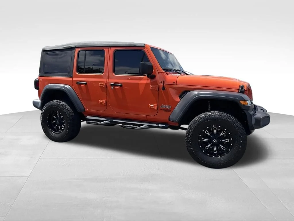 Used 2019 Orange Jeep Unlimited Sport image 10