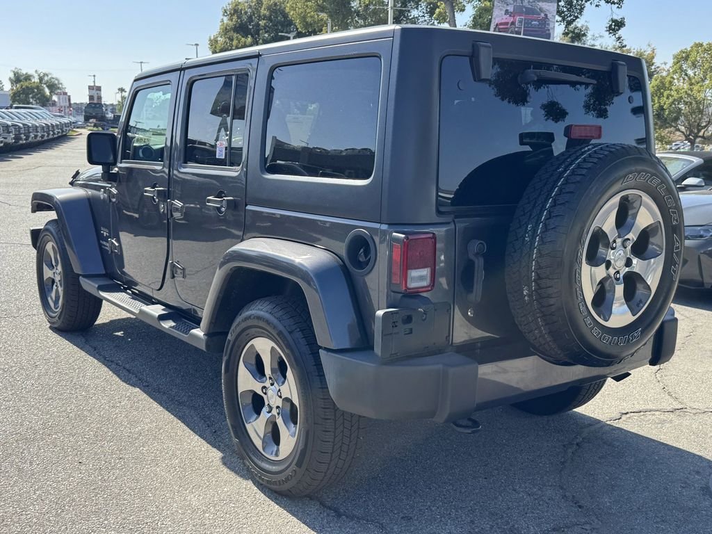 Certified Used 2018 Granite Crystal Clearcoat Metallic Jeep Unlimited Sahara image 4