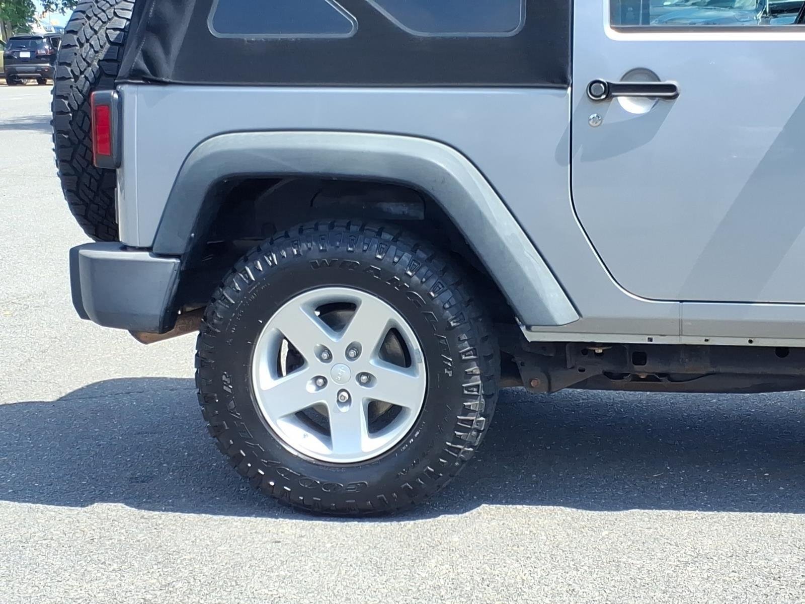 Used 2015 Billet Silver Metallic Clearcoat Jeep Sport image 10