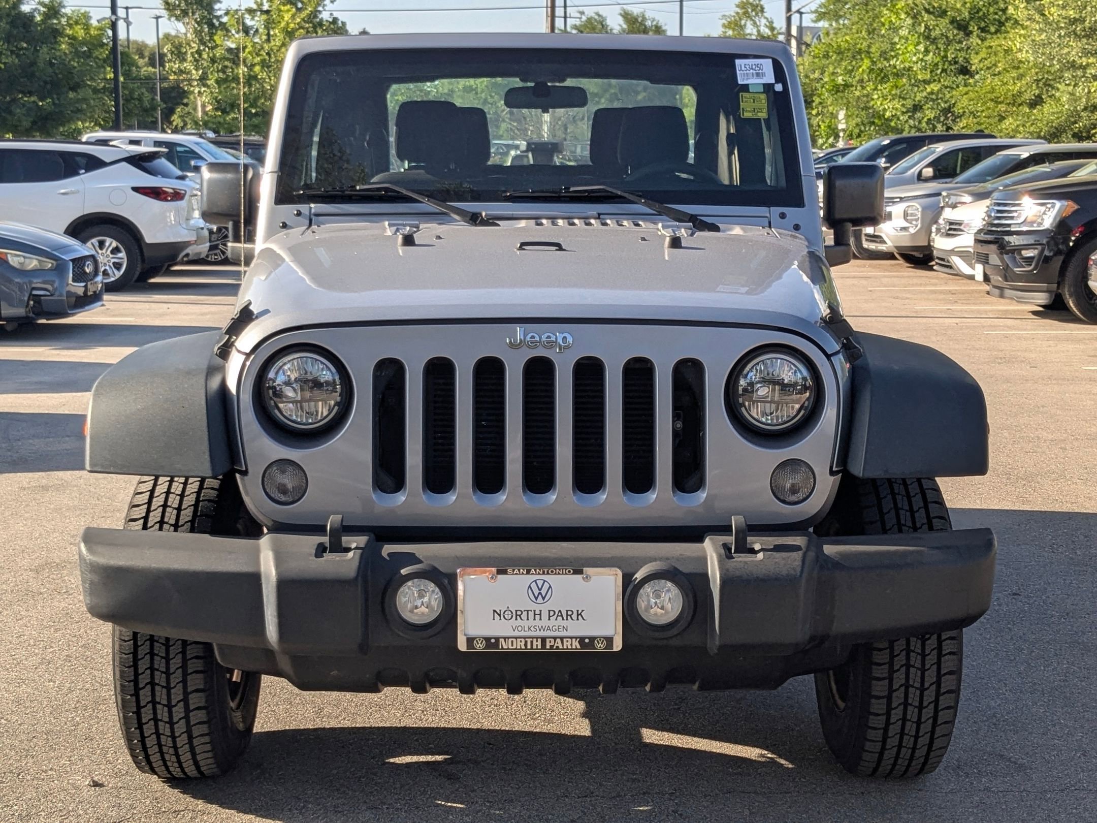 Used 2015 Billet Silver Metallic Clearcoat Jeep Sport image 8