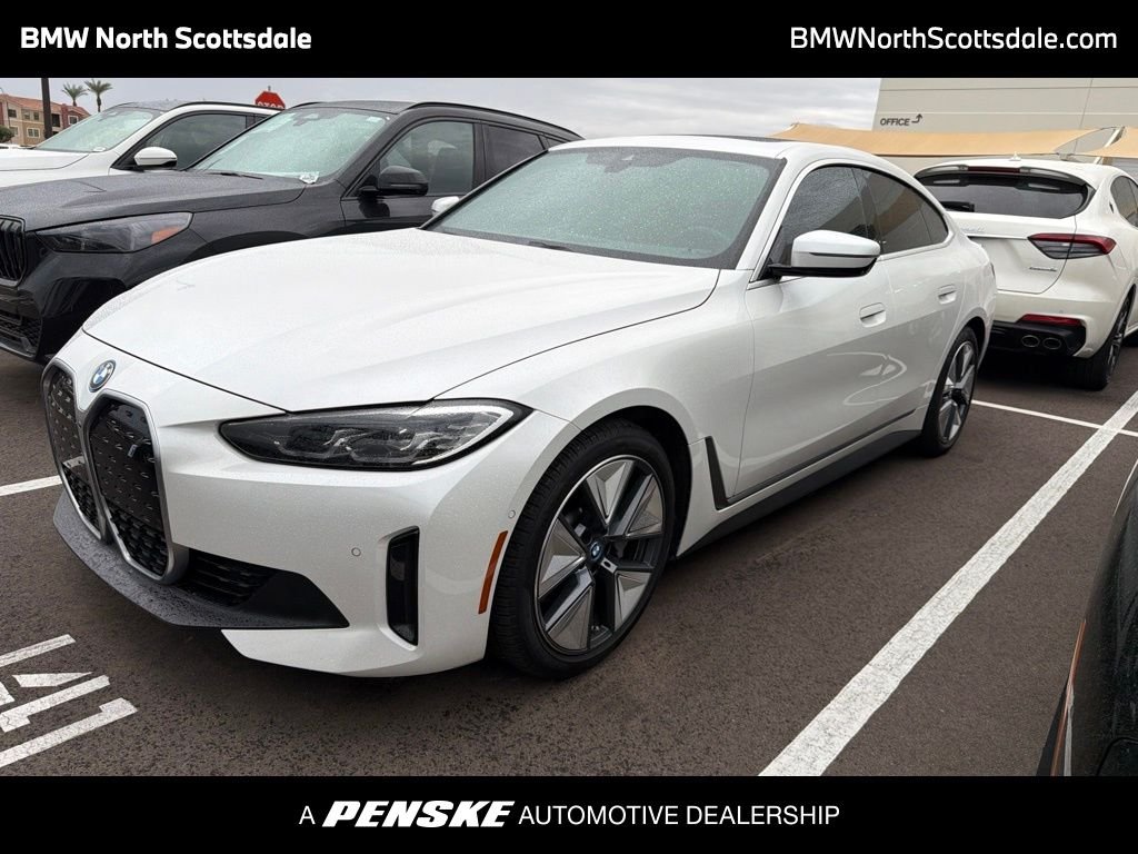 Certified Used 2023 White Metallic BMW eDrive40 image 1