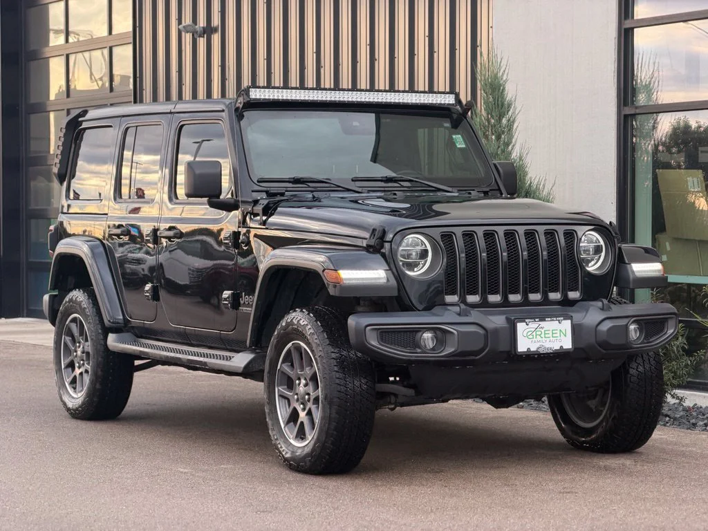 Used 2021 Black Jeep Unlimited Sahara image 4