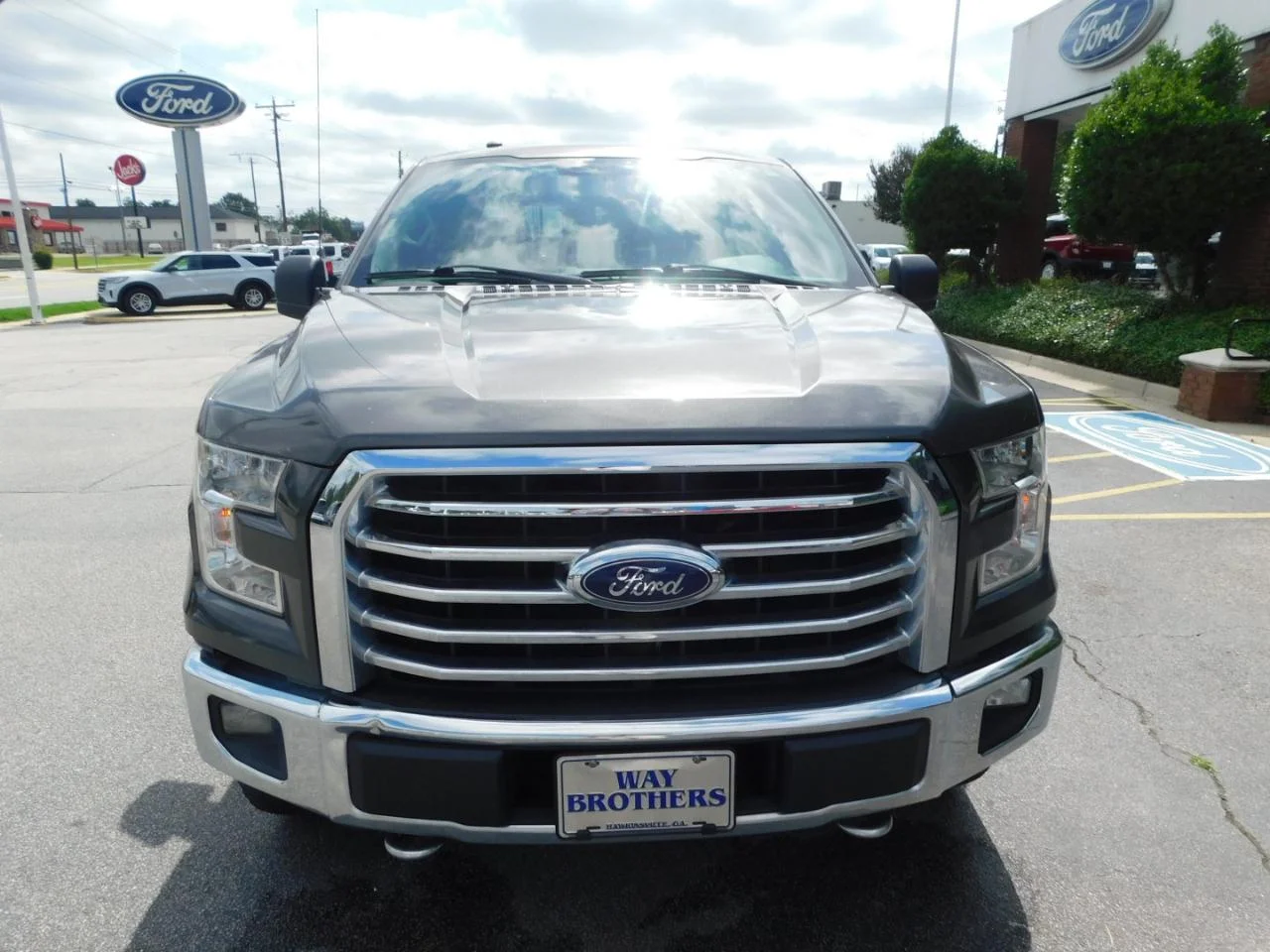 Used 2016 Magnetic Ford 4WD SuperCab 145 in XLT image 3