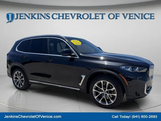 Used 2024 Black BMW sDrive40i image 1