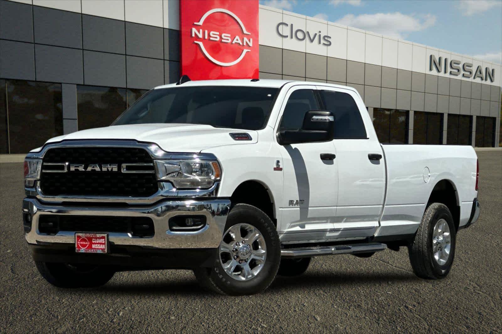 Used 2024 Bright White Clearcoat Ram Big Horn image 1