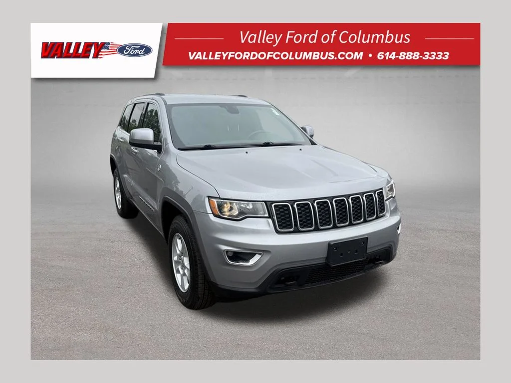 Used 2017 Billet Silver Metallic Clearcoat Jeep Laredo image 1