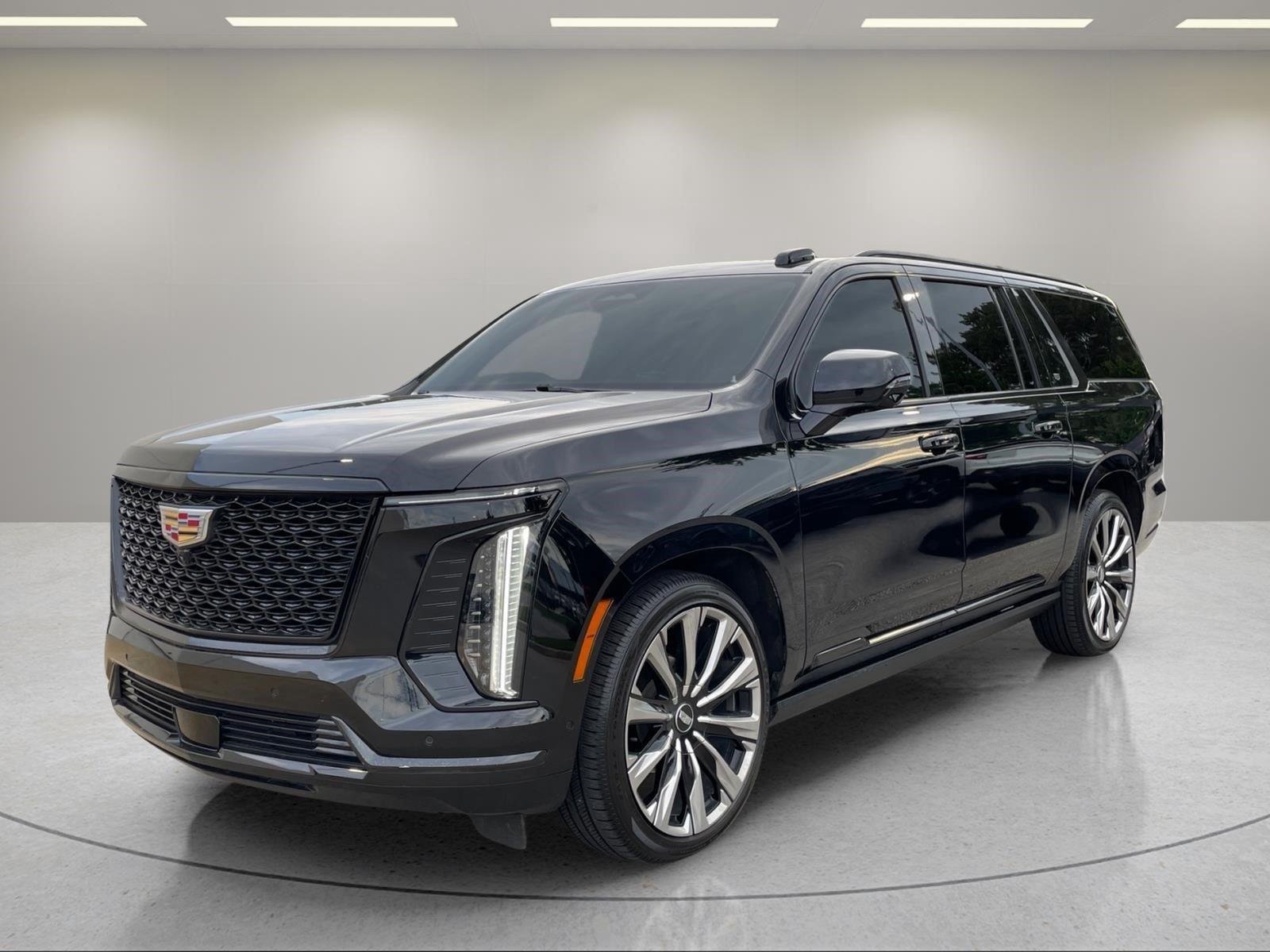 Used 2025 Black Raven Cadillac 4WD Premium Luxury image 1