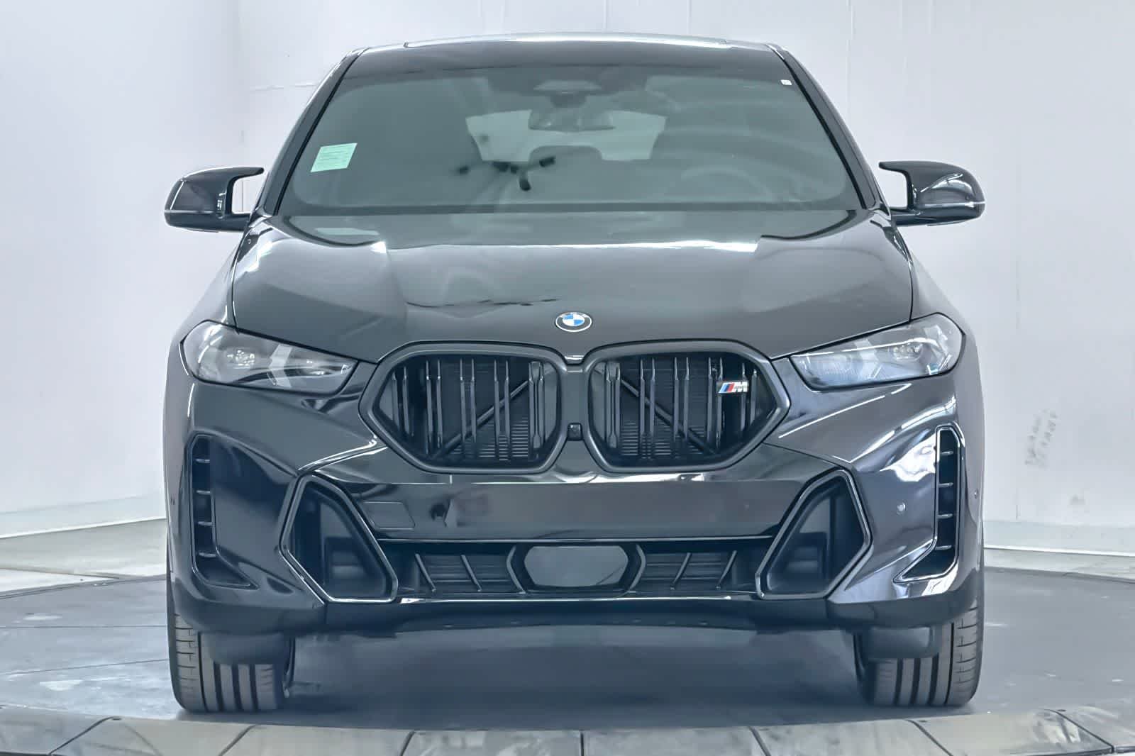 New 2026 Black Sapphire Metallic BMW M60i image 10
