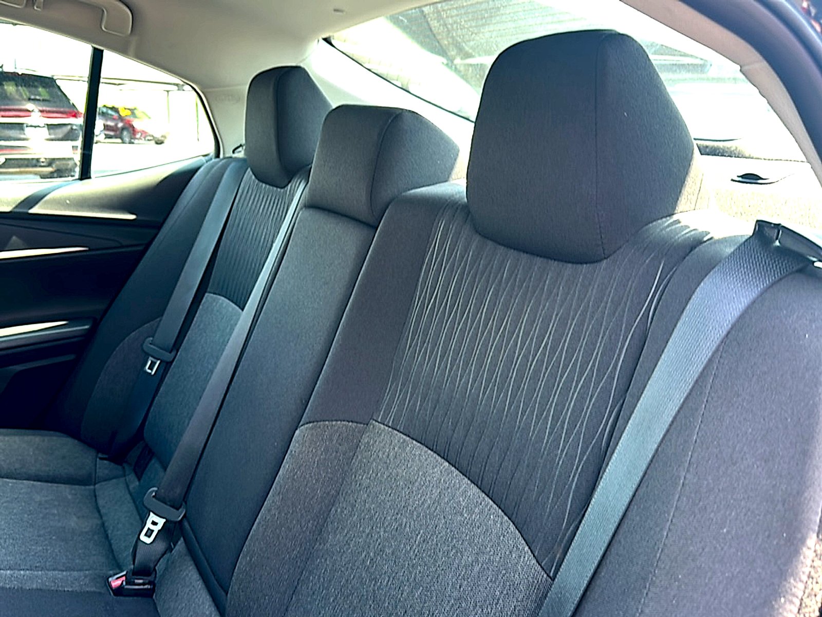 Used 2025 Super Black Toyota LE image 19