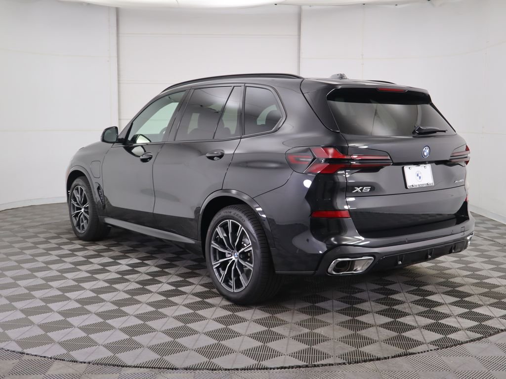 Used 2026 Black Sapphire Metallic BMW xDrive50e image 8