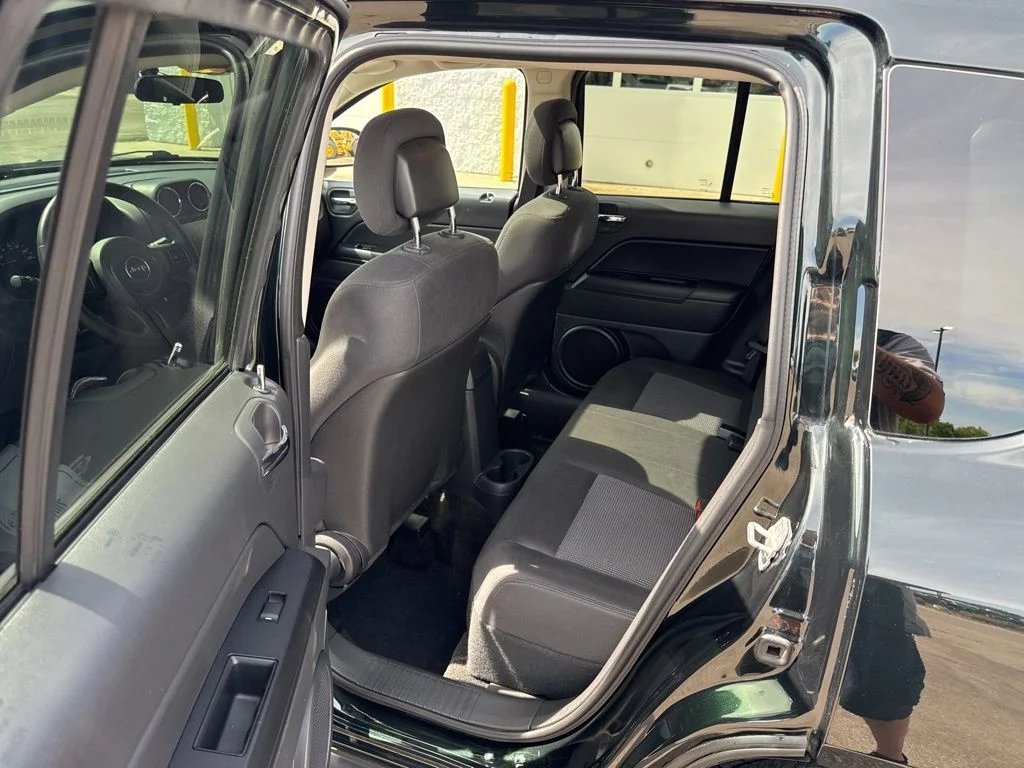 Used 2013 Black Forest Green Pearlcoat Jeep Latitude image 29