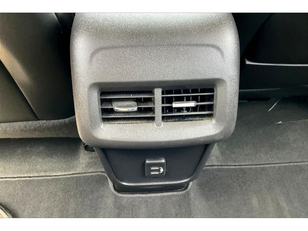 Used 2024 Ebony Twilight Metallic GMC AT4 image 23
