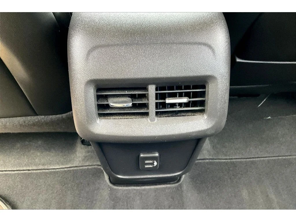 Used 2024 Ebony Twilight Metallic GMC AT4 image 23