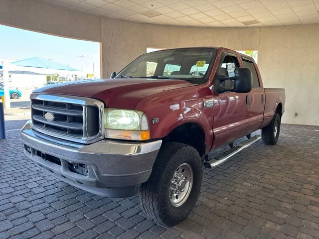 Used 2002 Red Ford Lariat image 1