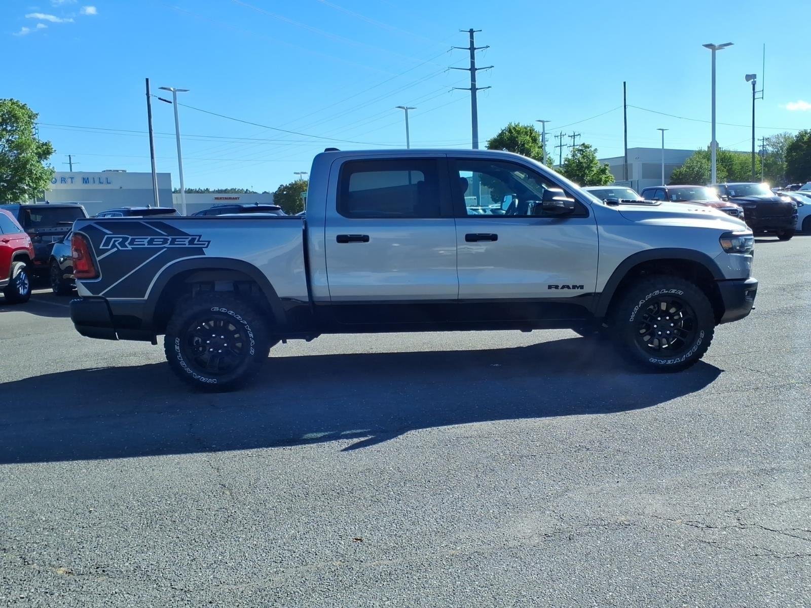 Used 2025 Billet Silver Metallic Clearcoat Ram Rebel image 10