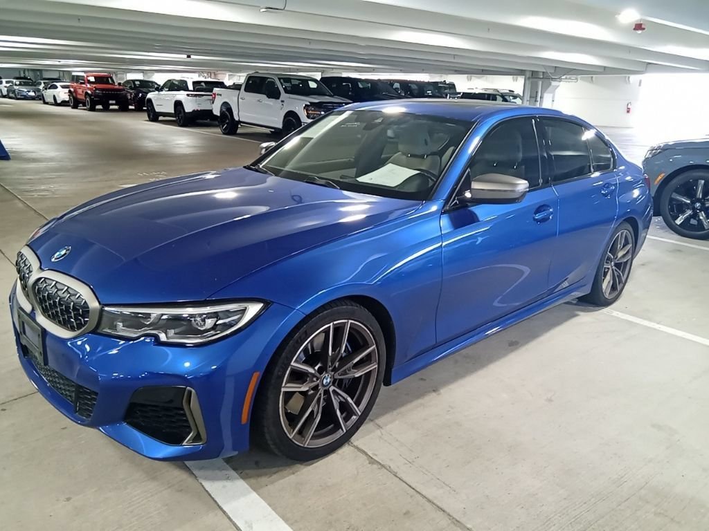 Used 2022 Blue Metallic BMW M340i image 1