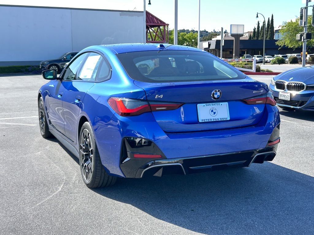 New 2026 Portimao Blue Metallic BMW eDrive40 image 3