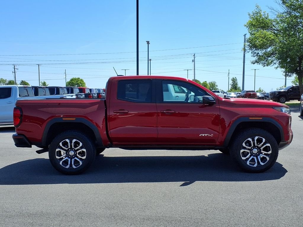 Used 2024 Volcanic Red Tintcoat GMC AT4 image 18