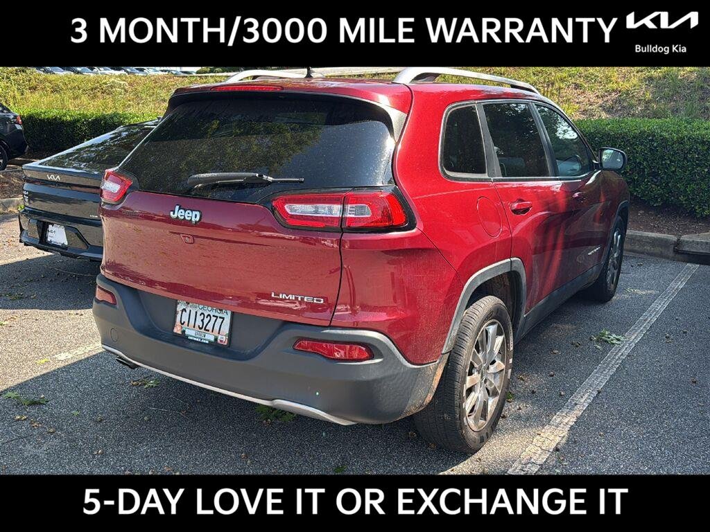 Used 2014 Deep Cherry Red Crystal Pearlcoat Jeep Limited image 2