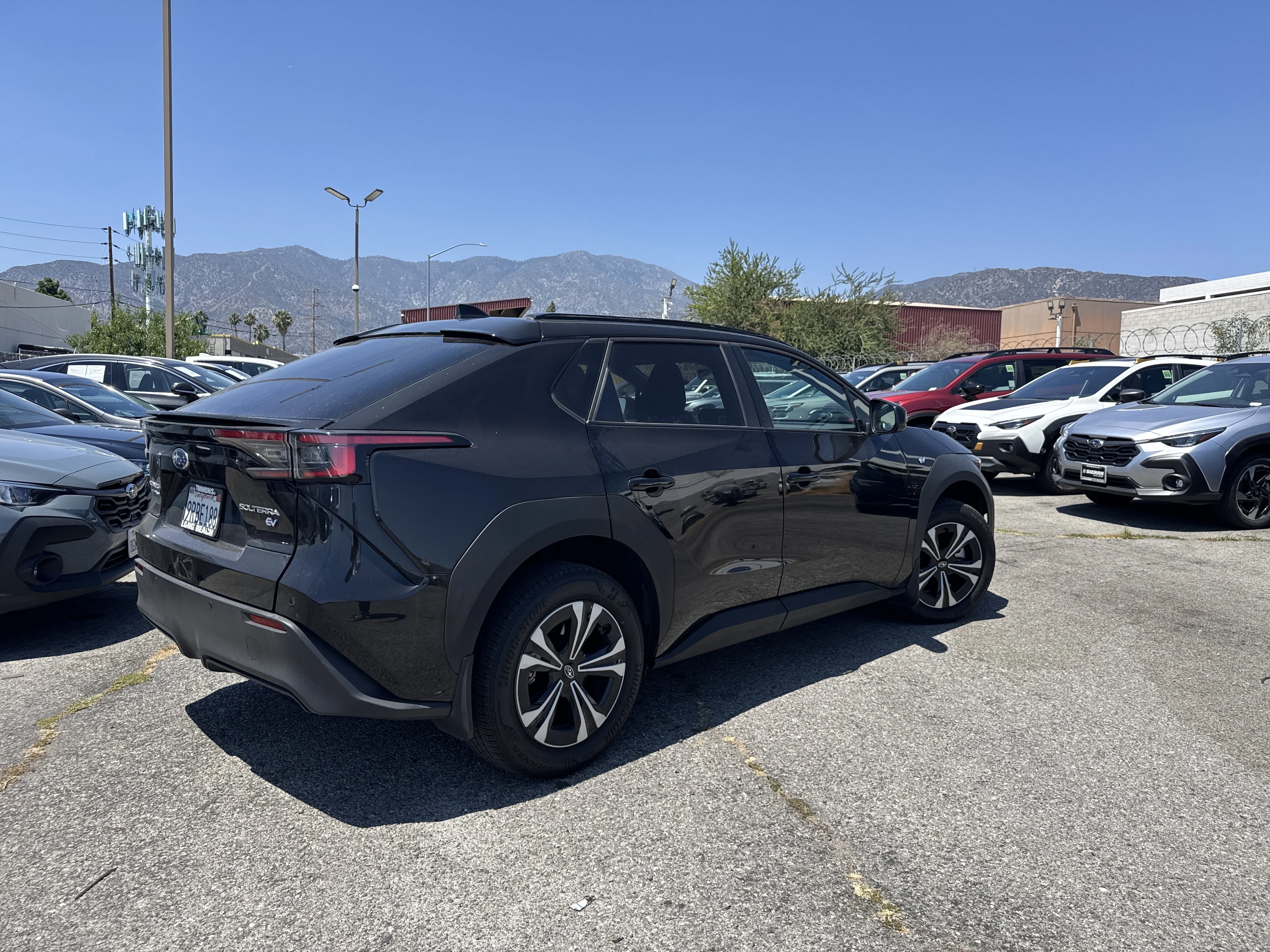 Used 2024 Galactic Black Subaru Premium image 3