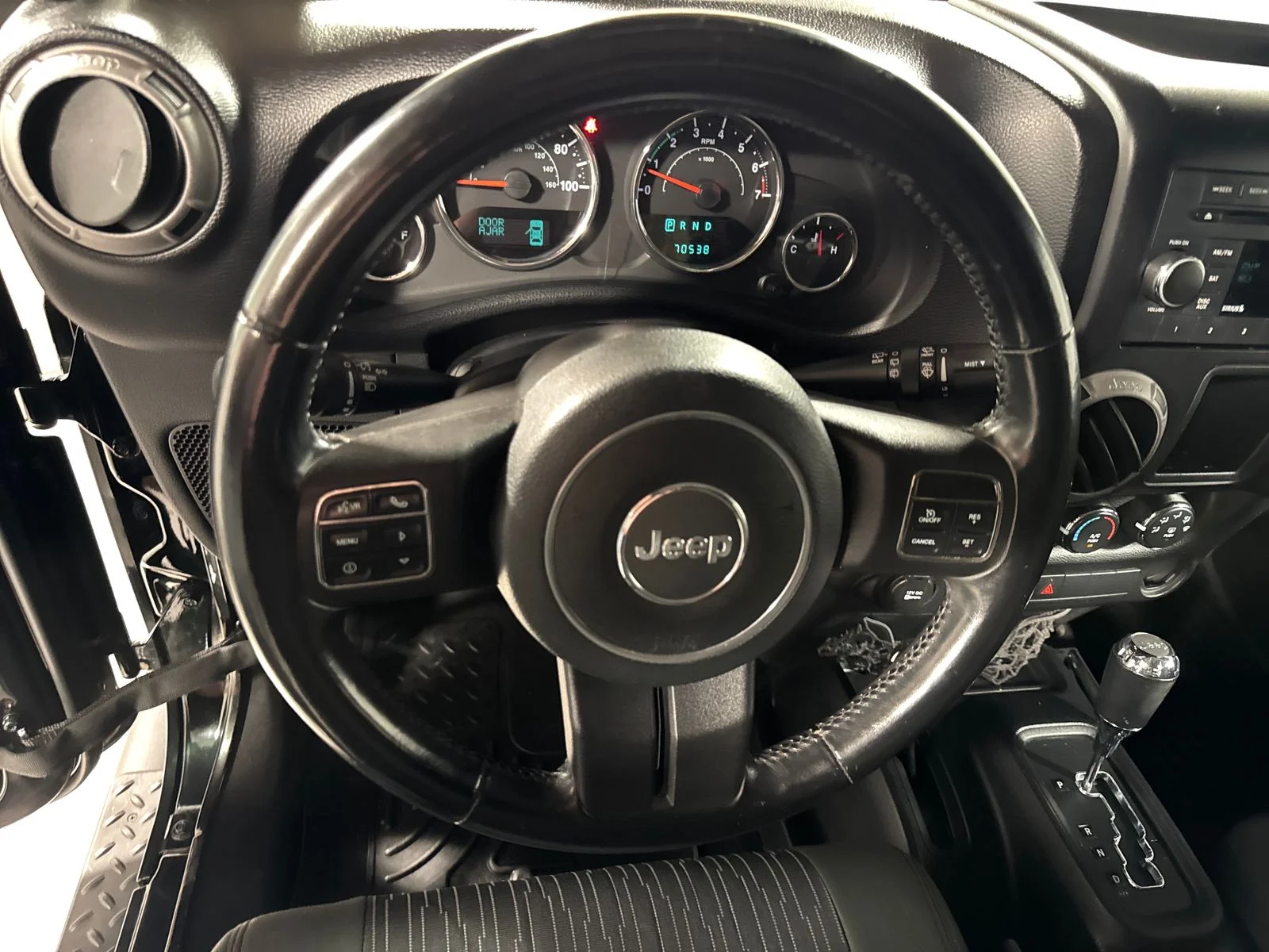 Used 2012 Black / Forest Green Jeep Sport image 17