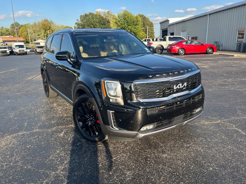 Used 2022 Ebony Black Kia SX image 1