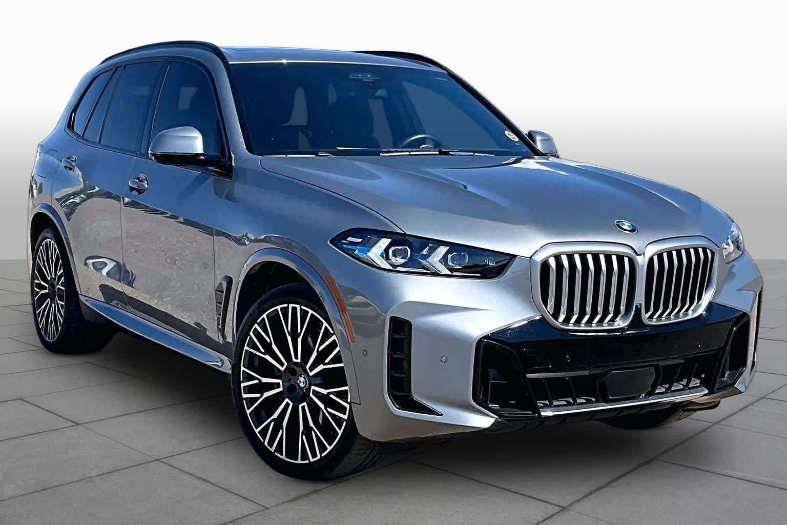 Used 2024 Skyscraper Grey Metallic BMW xDrive40i image 2