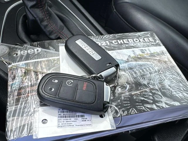 Used 2021 Orange Jeep Trailhawk image 4