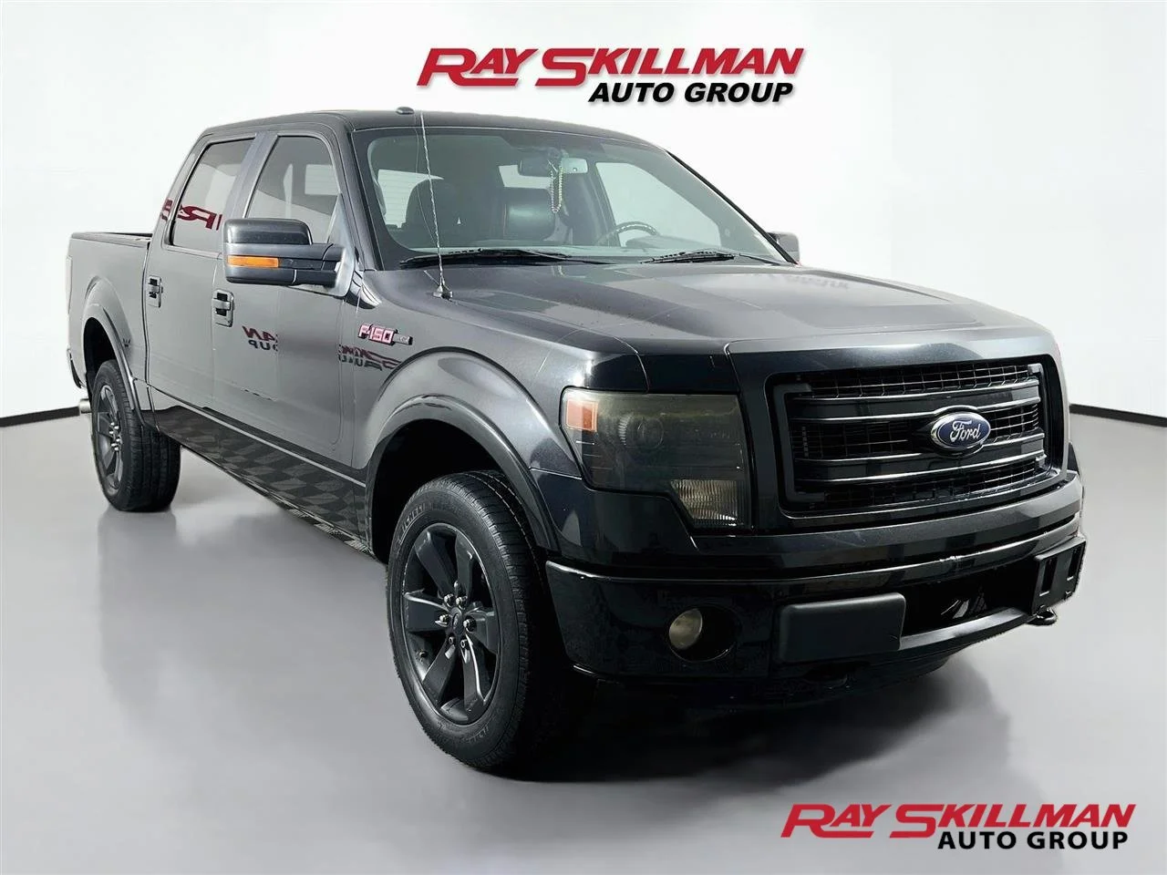 Used 2013 Black Ford FX4 image 1