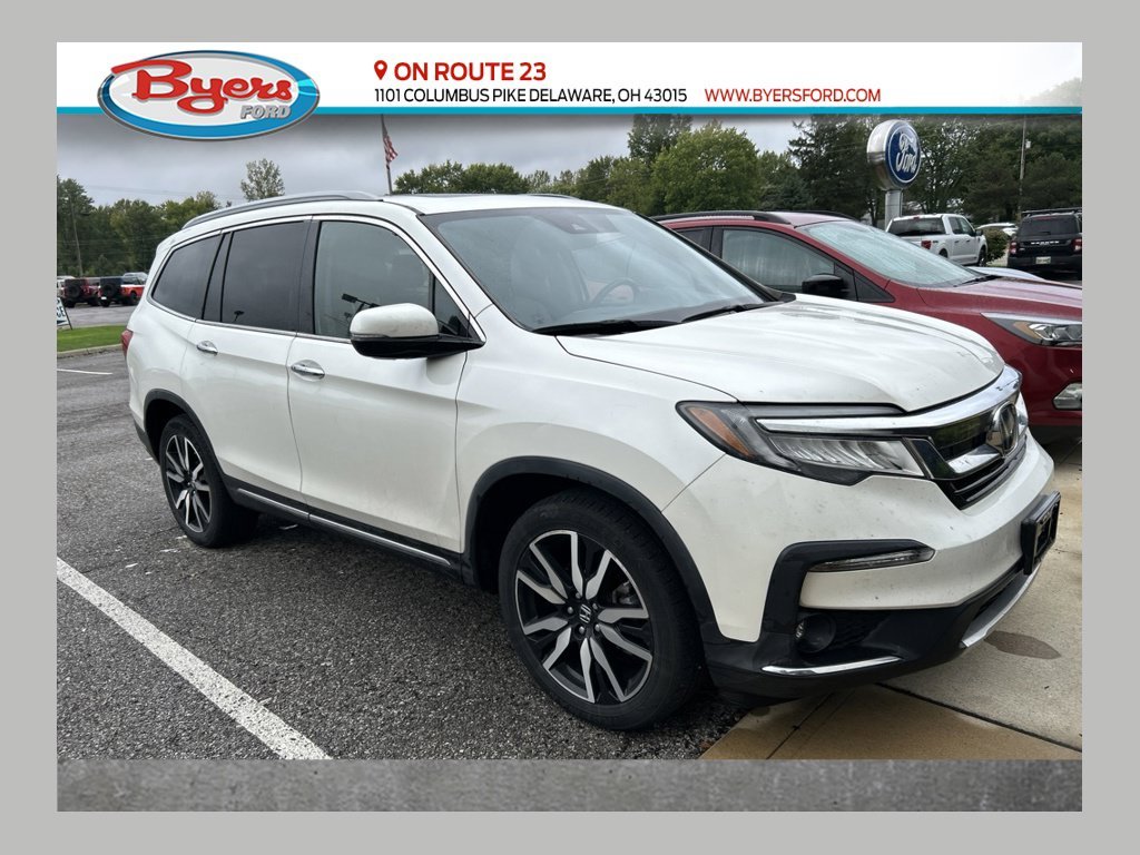 Used 2019 White Diamond Pearl Honda Touring image 1