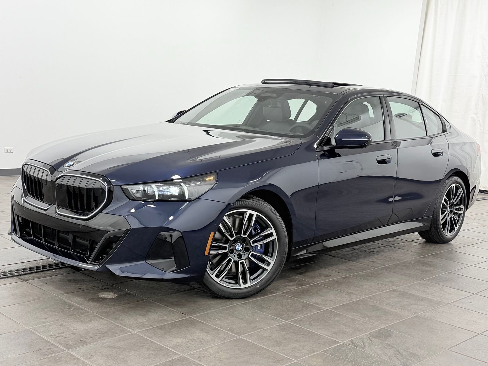 2027 BMW 5 Series 540i xDrive Sedan's photo