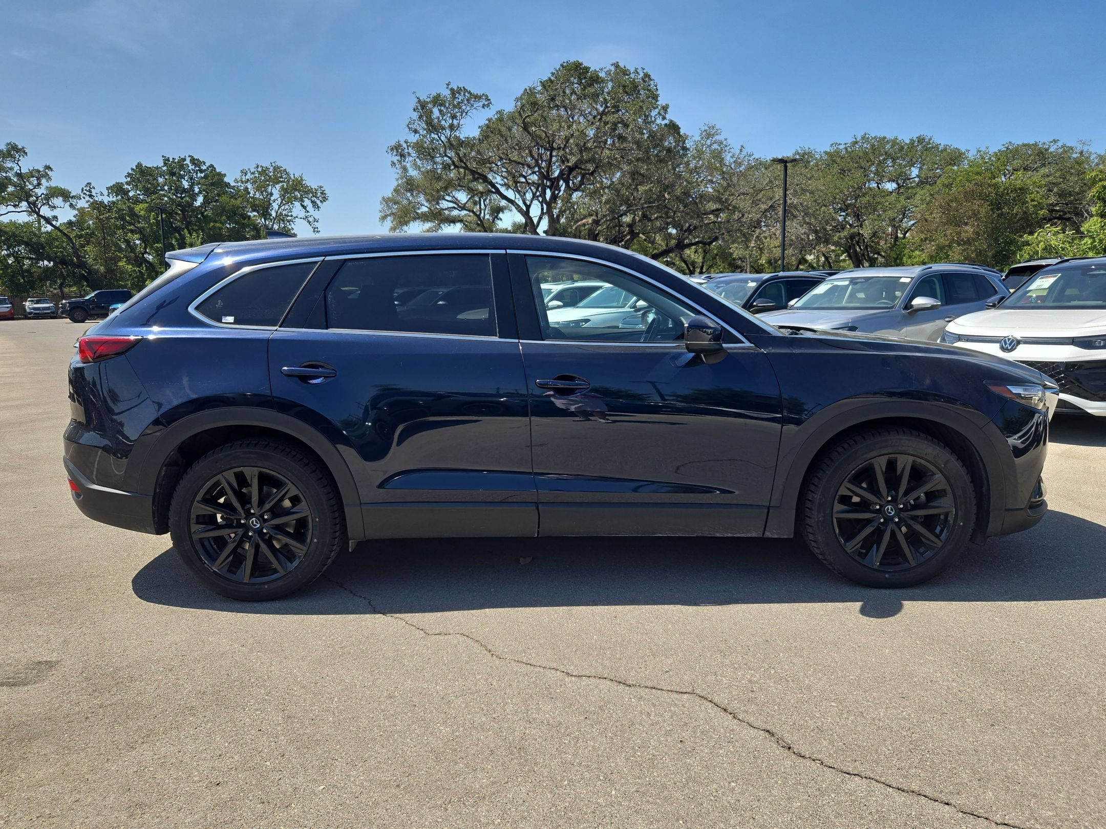 Used 2023 Deep Crystal Blue Mica Mazda Touring Plus image 2