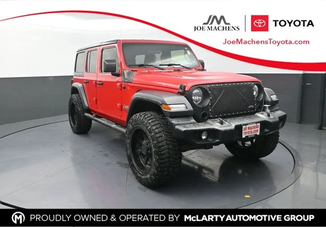 Used 2018 Red Jeep Unlimited Sport image 1