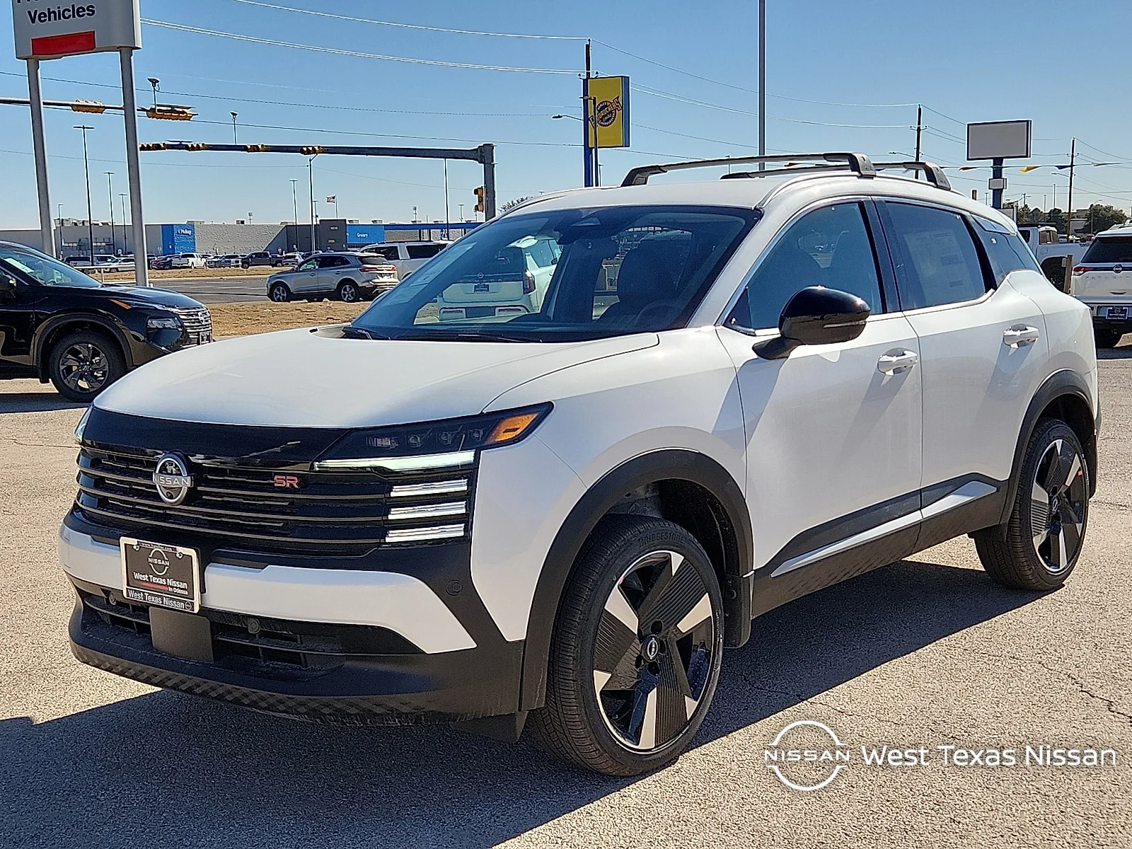 New 2026 QAC Aspen Whit Nissan SR Front-Wheel Drive image 1