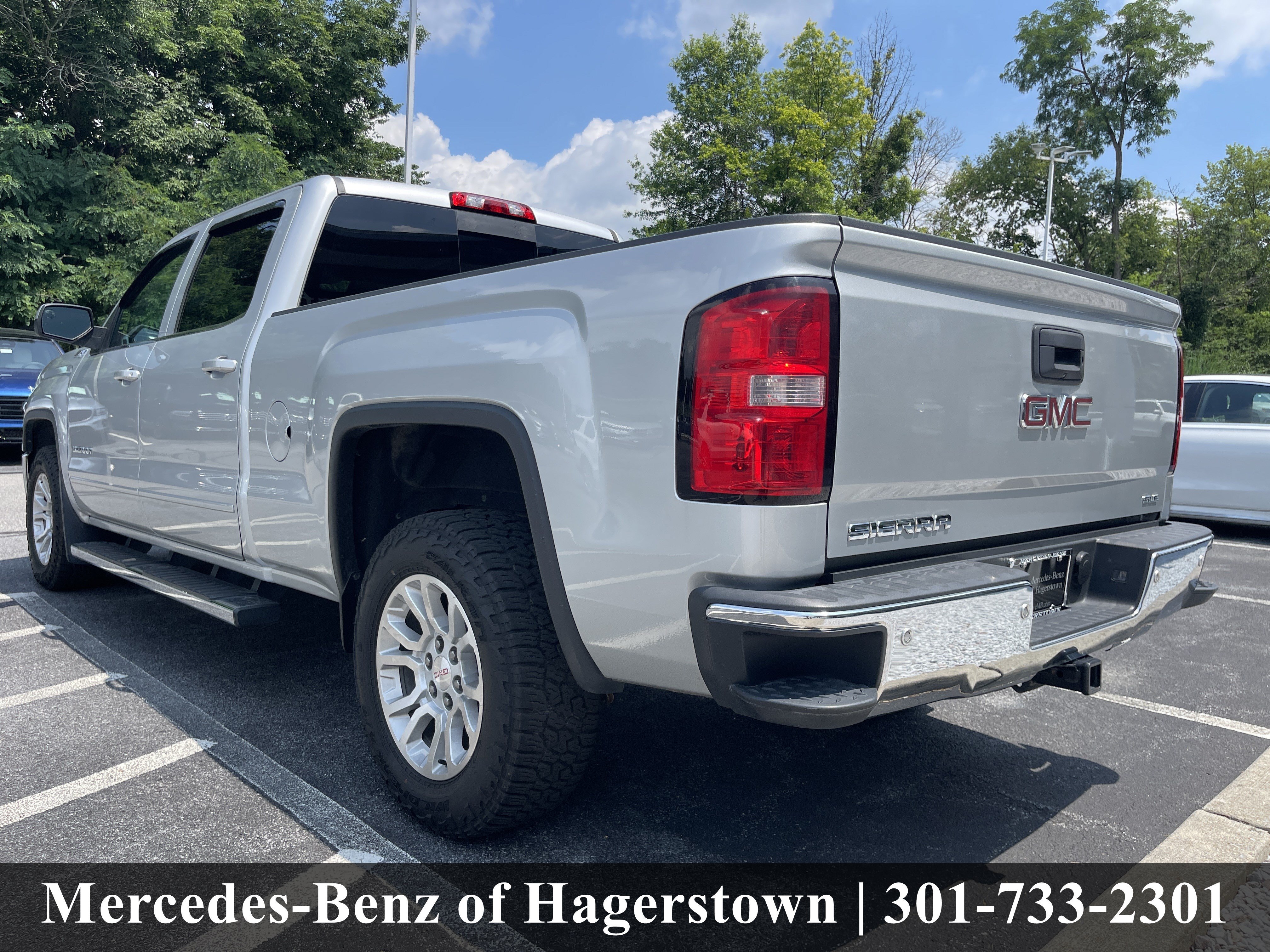 Used 2015 Quicksilver Metallic GMC SLE 4WD Crew Cab 153.0 image 30