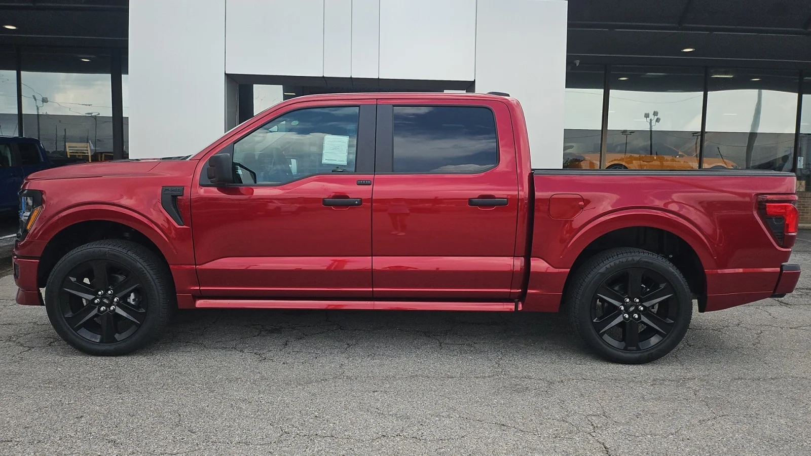 New 2026 Ruby Red Metallic Tinted Clearcoat Ford STX Lobo 4WD image 2