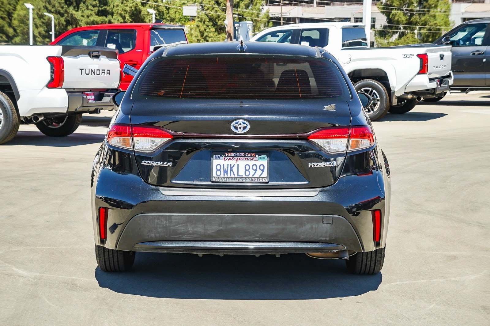 Used 2021 Black Sand Pearl Toyota Hybrid LE image 5
