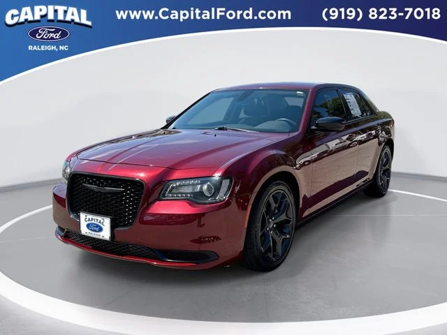 Used 2023 Red Chrysler Touring image 1
