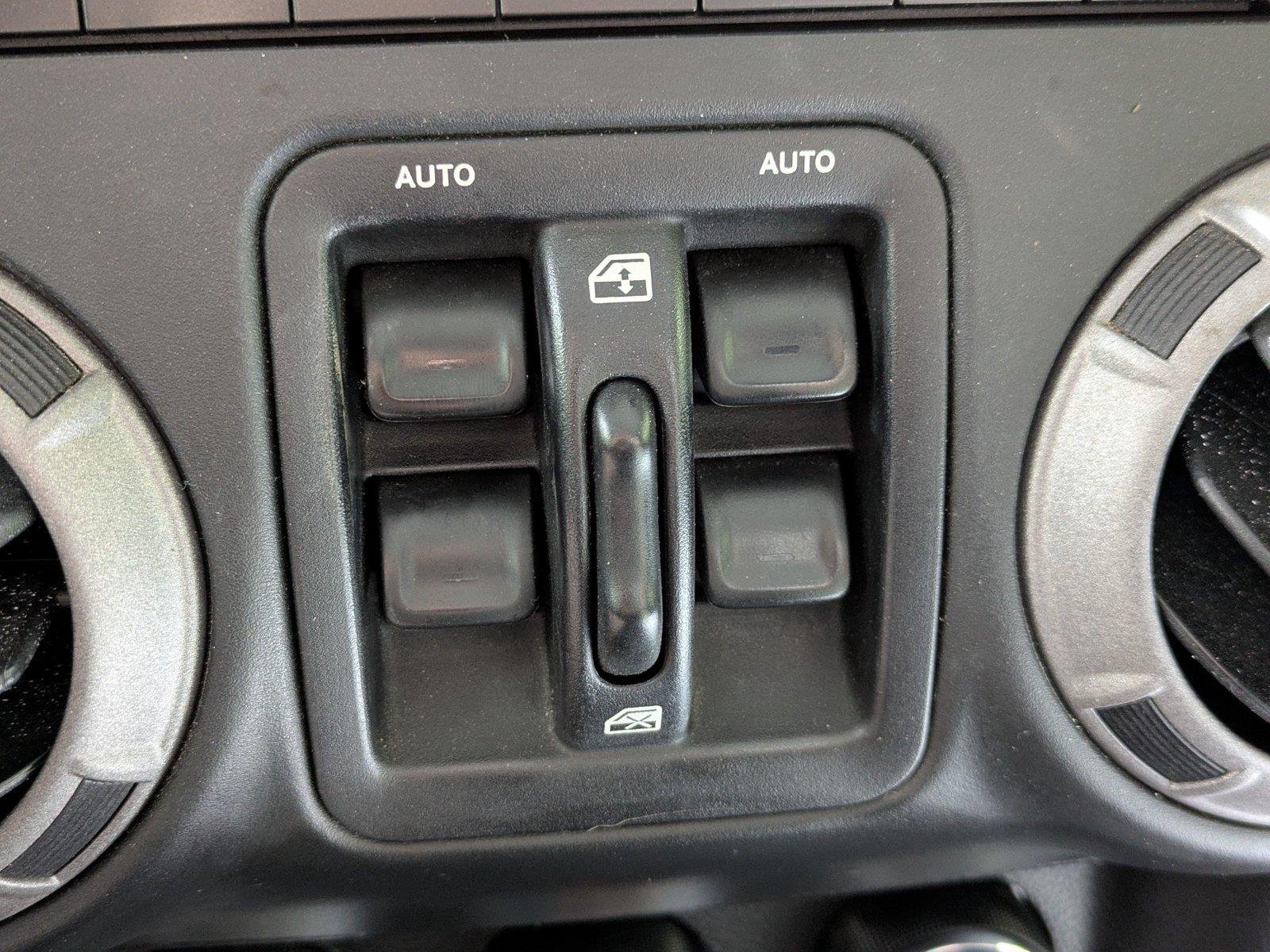 Used 2015 Hydro Blue Pearl Coat Jeep Sport image 20
