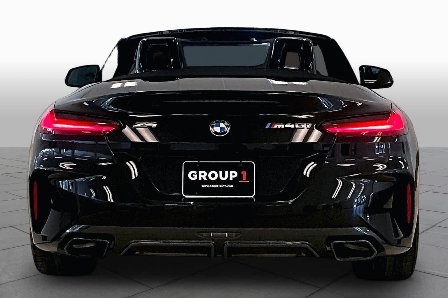 Used 2022 Black Sapphire Metallic BMW sDriveM40i image 4