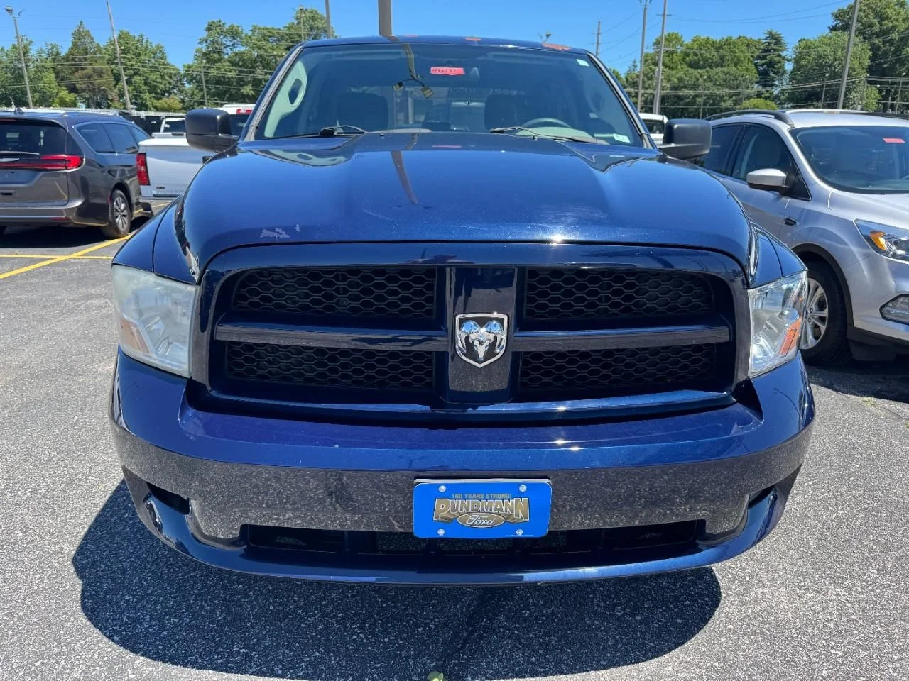 Used 2012 True Blue Pearlcoat Ram 2WD Crew Cab 140.5" Express image 2