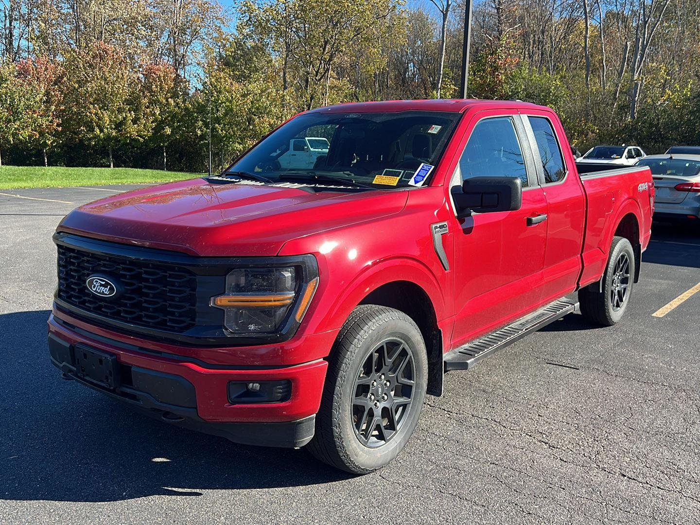 Used 2024 Rapid Red Metallic Tinted Clearcoat Ford STX image 2