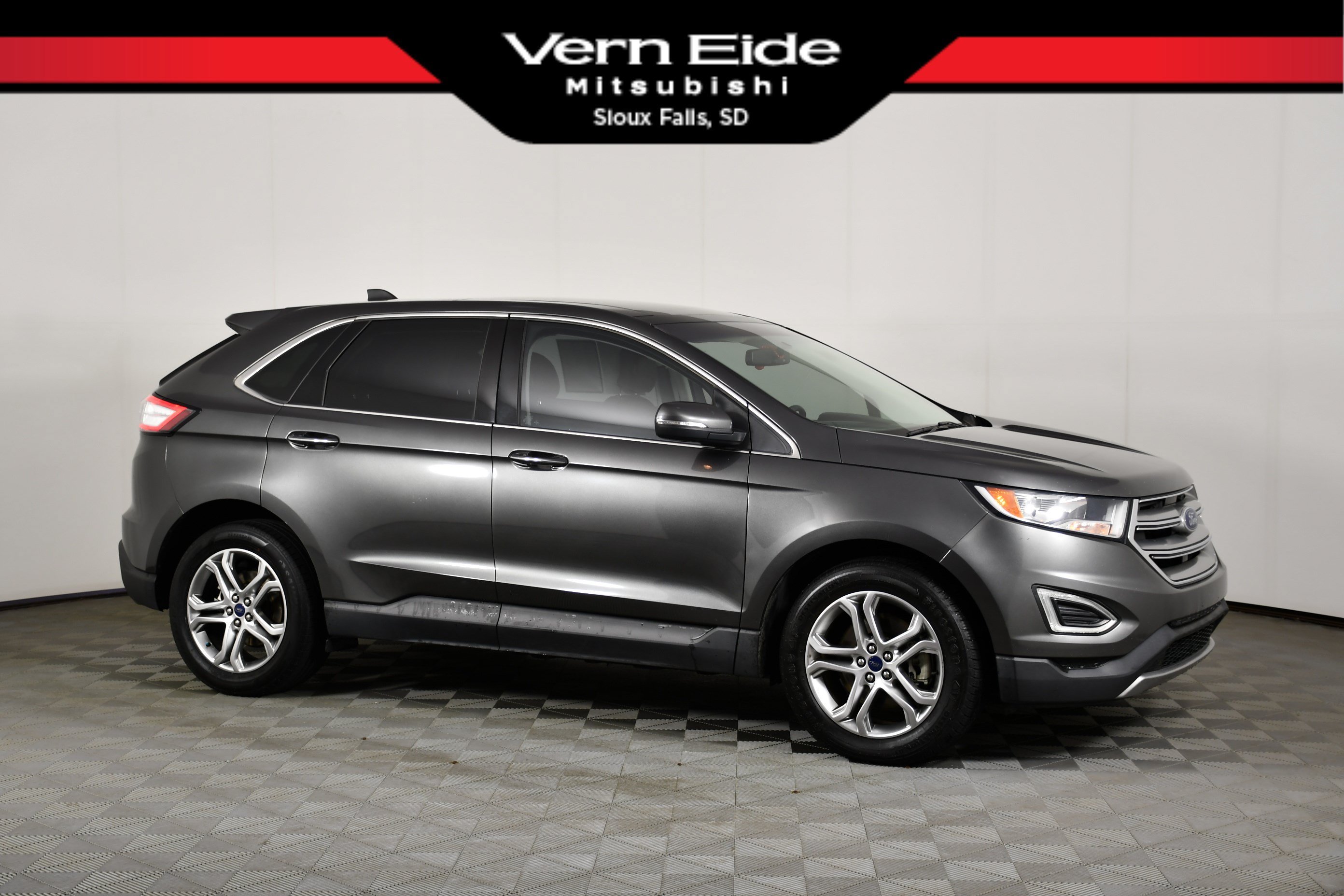Used 2016 Magnetic Ford Titanium image 1