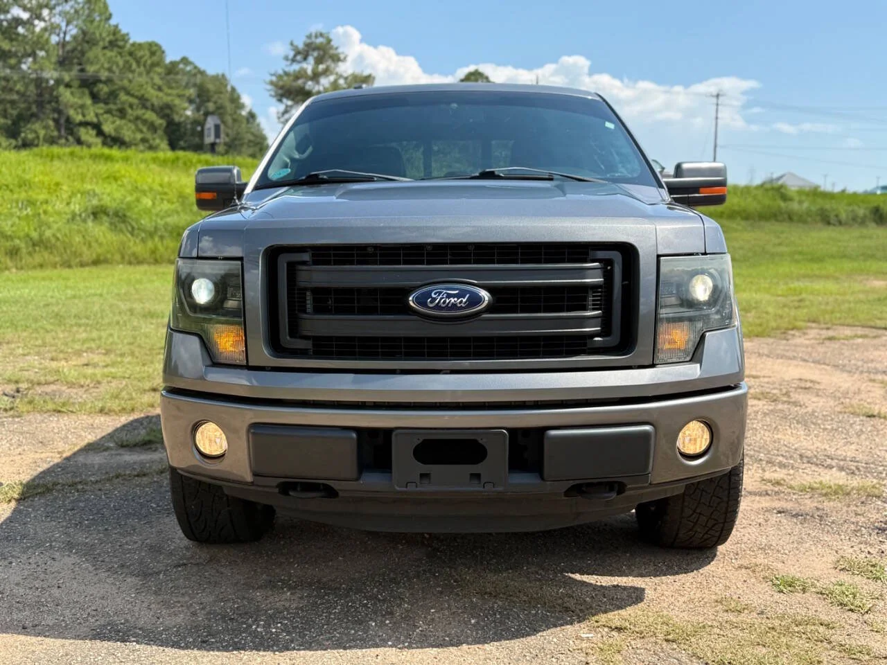 Used 2013 Gray Ford FX4 4x4 4dr SuperCrew Styleside 5.5 ft. SB image 8