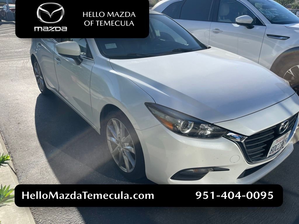 Used 2017 Snowflake White Pearl Mazda Touring 2.5 image 1