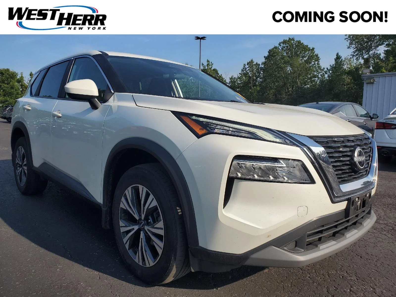 Used 2023 Pearl White Tricoat Nissan SV image 1